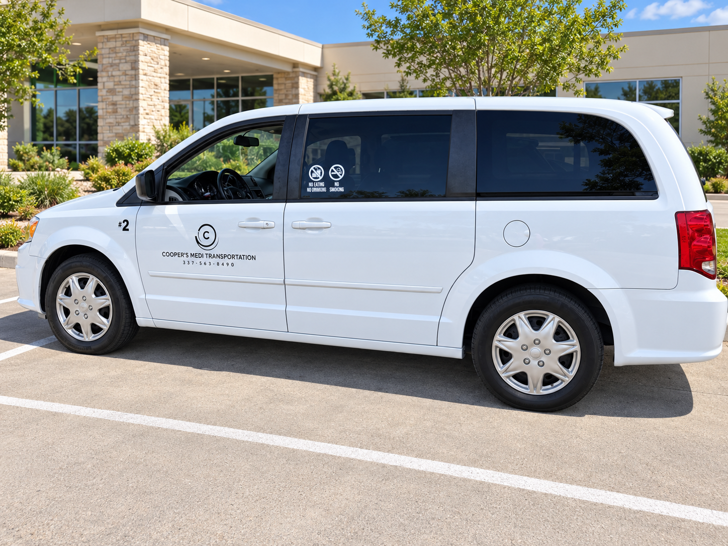 Cooper's Medi Transportation white passenger van outside a medical office